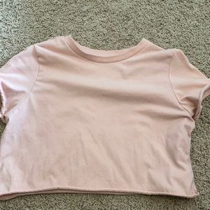 pink cropped shirt